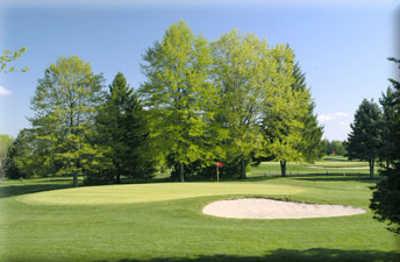 A view of a green protected by sand trap at Mattawang Golf Club