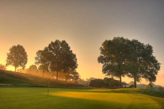A sunny view of a green at Edgewood Country Club