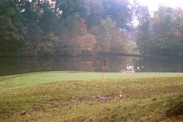 A view of a green with water coming into play at Meadowink Golf Course