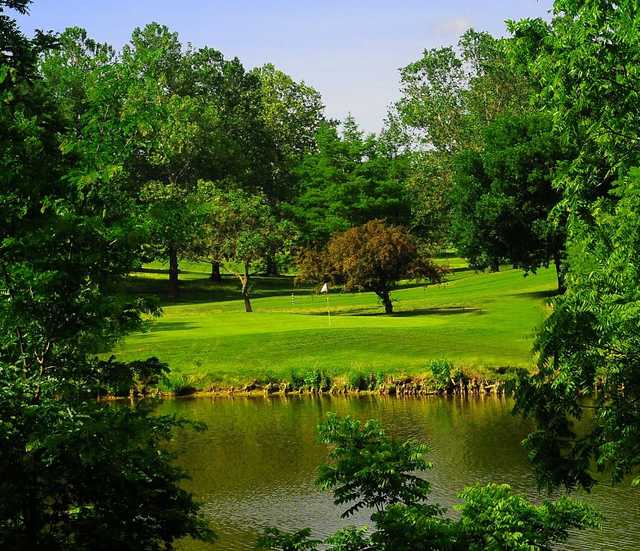 A view over the water of a hole at Cypress Ridge Golf Course