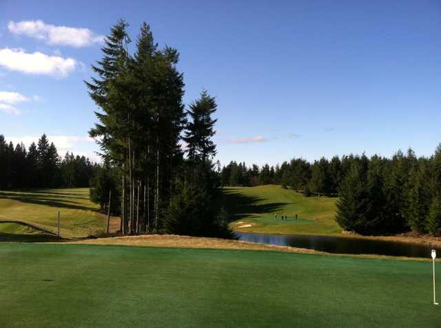 A view from the practice putting green at Gold Mountain Golf Course