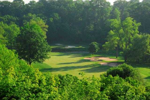 View of a green and bunker at Glen Abbey Golf Club