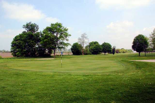 A view of a hole protected by bunkers at Olde Mill Golf Course