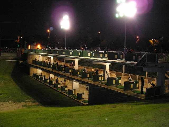 A night view of the Practice Center at Alhambra Golf Course