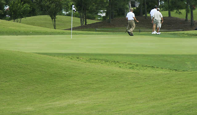 A view of a hole at Sugar Creek Golf & Tennis Club