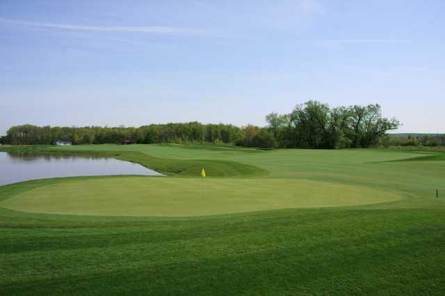 A view of the 3rd green with water coming into play at Shale Creek Golf Club