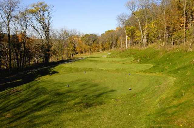 A fall view of a tee at Honey Creek Golf Club