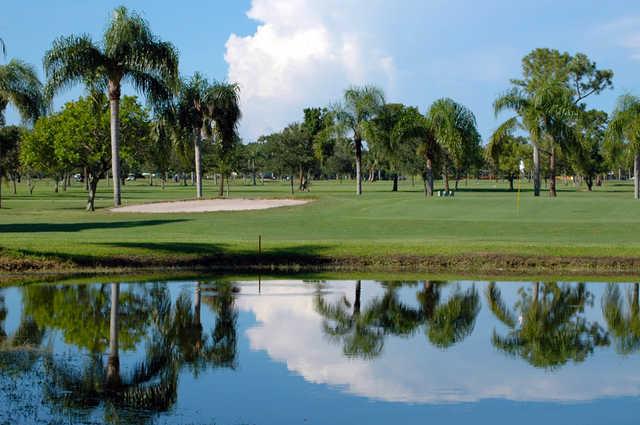 A view over the water of a green at Fort Myers Country Club