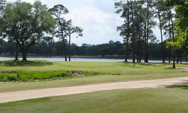 A view of green #3 with water in background at Quitman Country Club