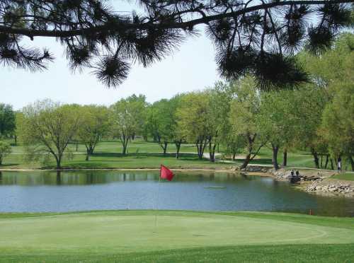 A view of a green with water coming into play at Western Hills Golf Club