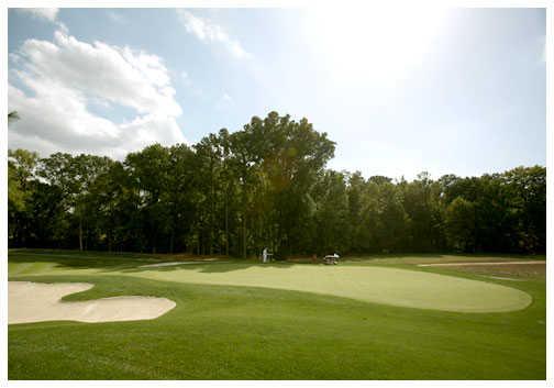 A view of a hole with narrow cart path in the distance at Lakes from Queenstown Harbor