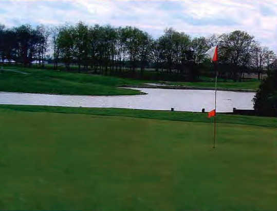 A view of a green with water coming into play at Marshall Golf Course