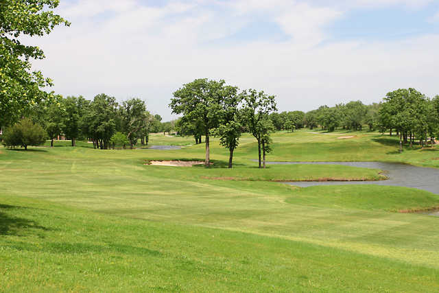 View of a fairway and green at Winter Creek Golf & Country Club