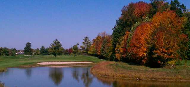 A fall view over the water of a green at The Legends Golf Club.