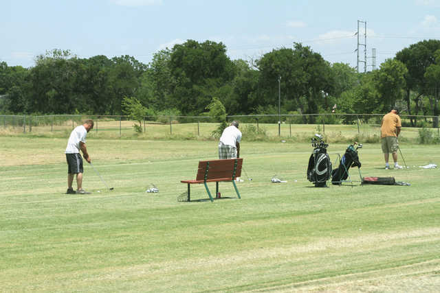 A view of the practice area at Sunset Golf Club