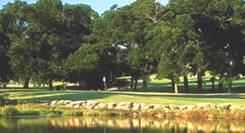 A view of a green at Pecan Valley Golf Course