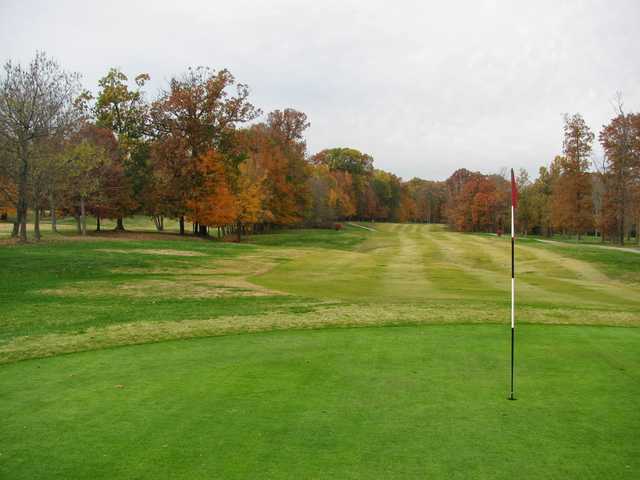 A fall view of a hole at Wooded View Golf Course