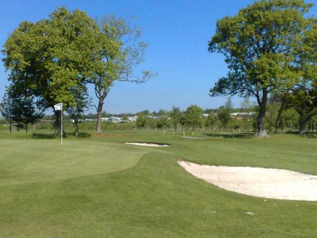 A view of a hole protected by bunkers at Percy Wood Golf & Country Retreat