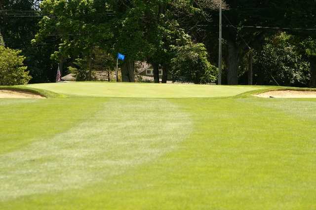 A view of green #16 flanked by bunkers at Spring Lake Country Club