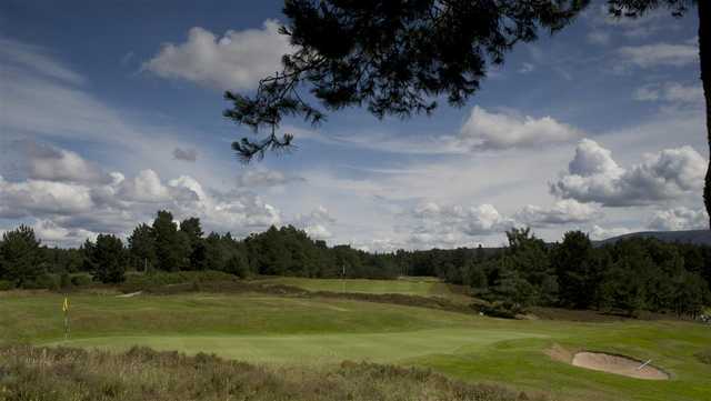 A view of a green protected by a bunker at Grantown-on-Spey Golf Club