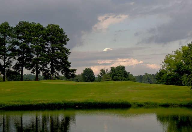 A view over the water of green #4 at Orgill Golf Course
