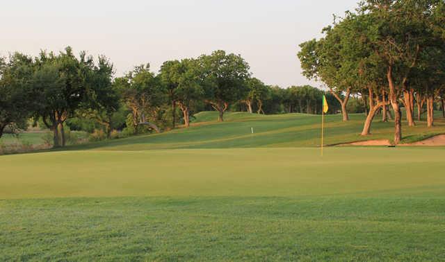 A sunny day view of a hole at SugarTree Golf Club