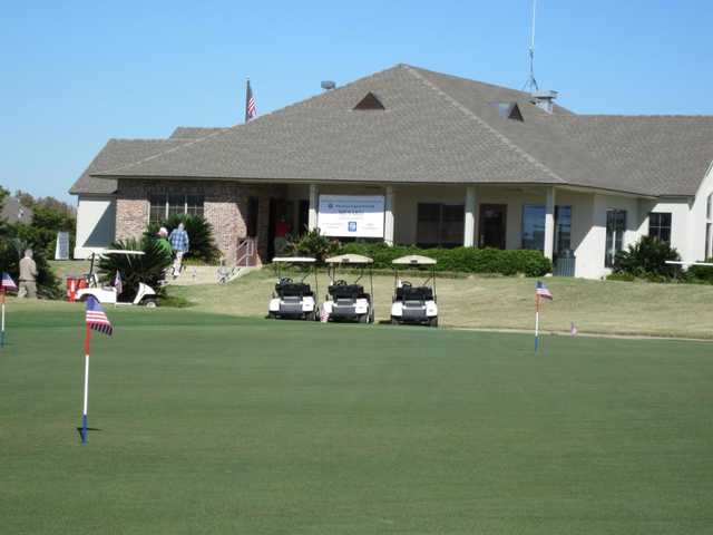 A view of the clubhouse and the practice area at Beaver Creek Golf Course