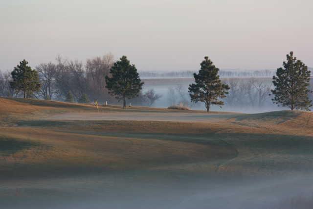 A foggy view of a hole at Lake Region Golf Course 