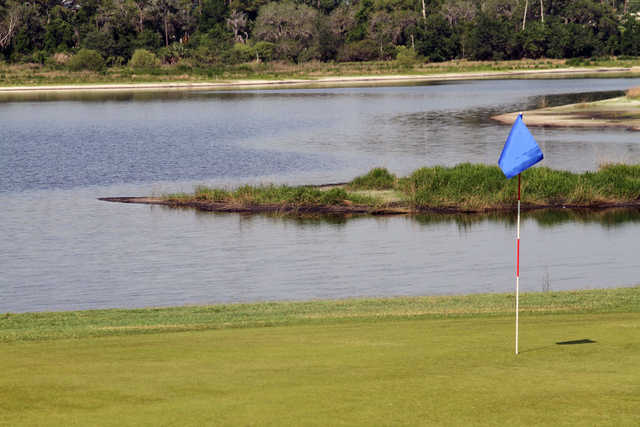 A view of a green with water coming into play at Glen Abbey Golf Club (SportsVolusia)