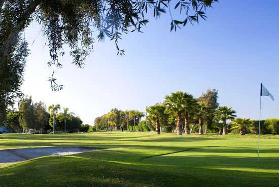 A view of a hole protected by a bunker from 3 Par at Four Points