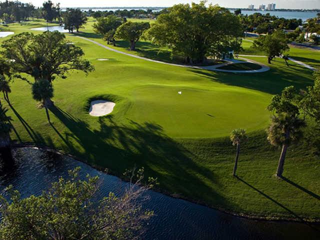 A view of a green with water coming into play at Normandy Shores Golf Course