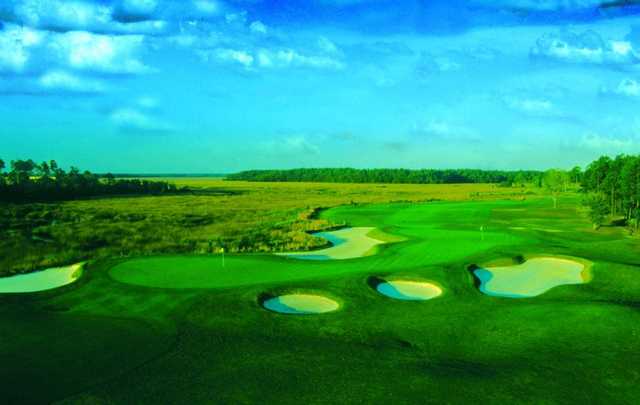 A view of a green protected by tricky bunkers from The Club at Osprey Cove Golf Club
