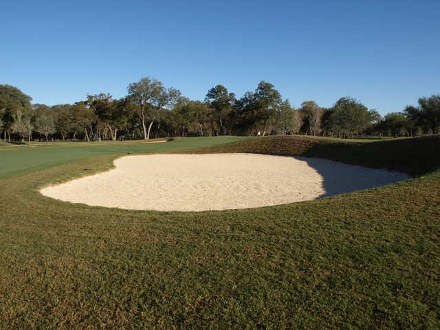 Brackenridge Park #1: Flat-bottomed bunkers in the fairway and around the greens at Brackenridge Park Golf Course also feature grassy slopes