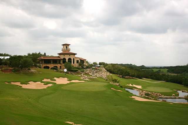 The 18th hole of the Westin La Cantera's Palmer Course features a dramatic shot downhill to the green protected by water.