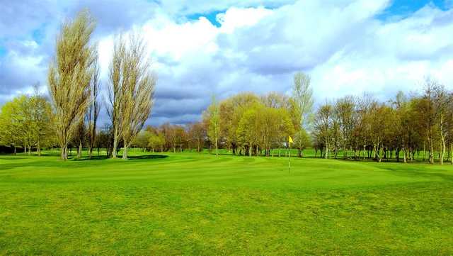 A view of a hole at Withington Golf Club