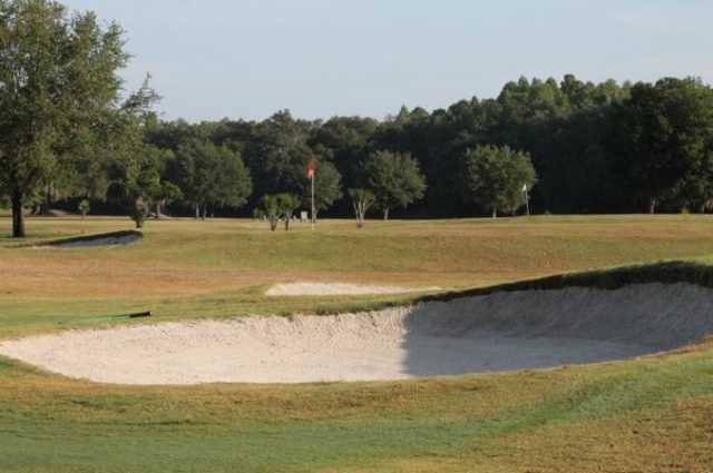 A view of hole #14 guarded by bunkers at Bartow Golf Course