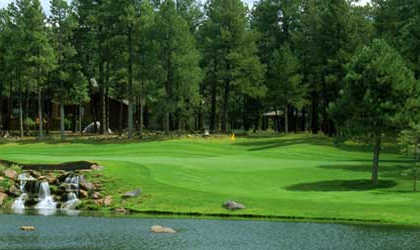 A view over the water from Canyon at Forest Highlands Golf Club