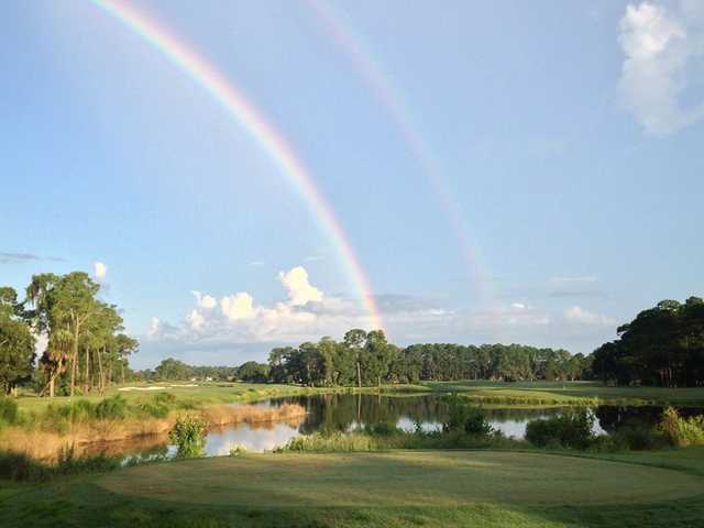 A double rainbow view over Grand Club Pine Lakes Course