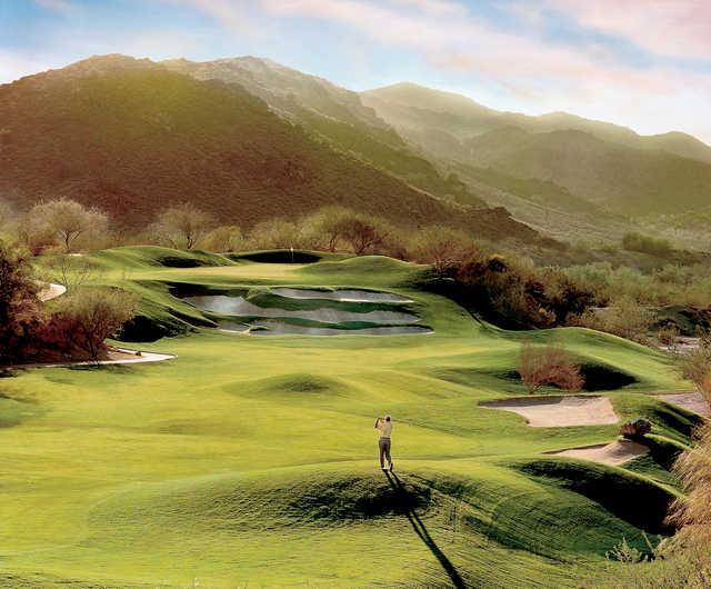  The signature hole at Arizona Grand is the long, par 5 13th that requires a shot up to an elevated green over a row of bunkers.