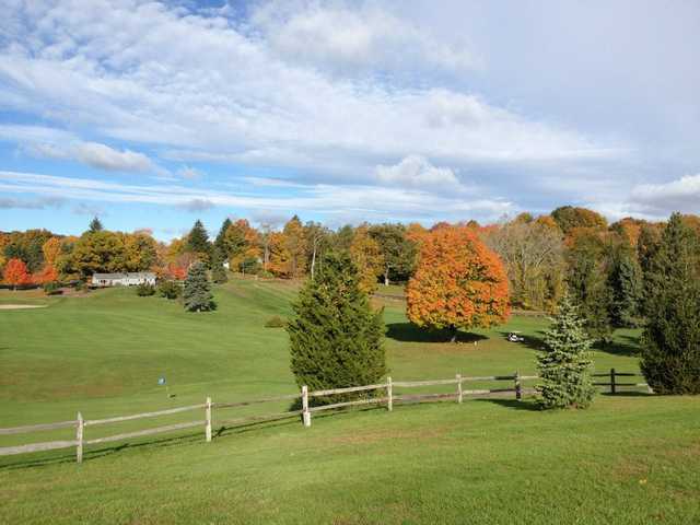 A view from the 5th hole with the clubhouse in the distance at Indian Springs Golf Club