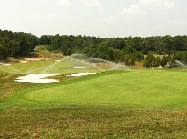 A view of a green protected by tricky bunkers at Eagle Ridge Golf Club