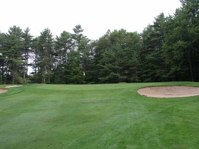 A view of green #1 flanked by sand traps at Ellinwood Country Club