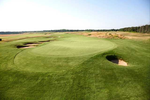 A view of green #9 protected by a collection of bunkers at Tallgrass Country Club