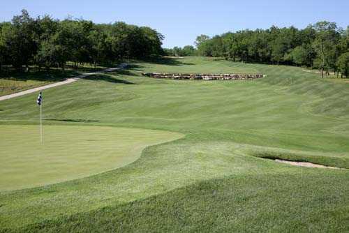 A view of a green and a fairway at Canyon Farms Golf Club