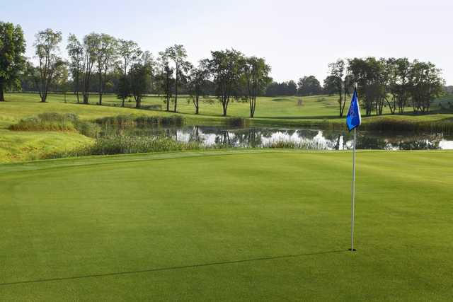 A view of a green with water coming into play at Legacy Hills Golf Club