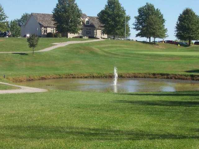 A view of hole #9 with a water fountain in foreground at Teetering Rocks Links