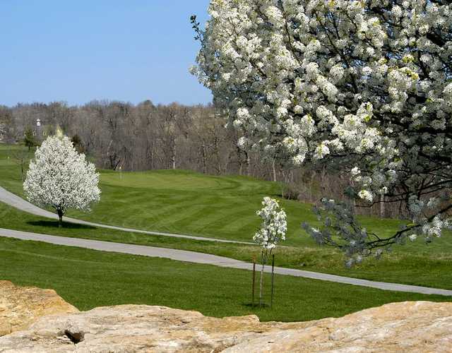 A splendid spring view of green #13 at Teetering Rocks Links