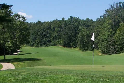 A view of a hole with a narrow path on the left side at Boonville Country Club