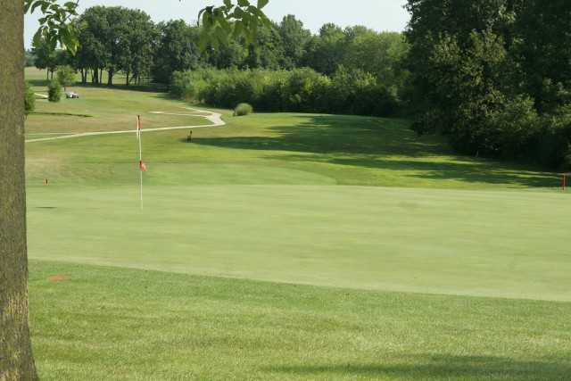 A view of a hole with a narrow path on the left side at Turtle Run Golf Club