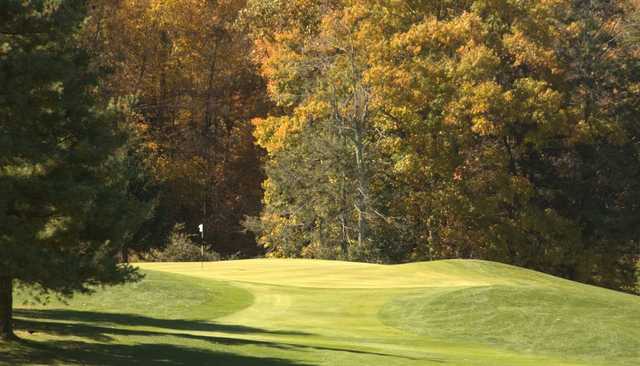 A sunny day view of a green at Boone Golf Club